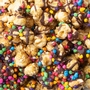 Chocolate Drizzled Caramel Popcorn with Rainbow Chips