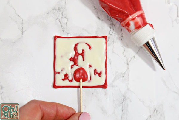 Chocolate Valentine's Day Cupcake Toppers - cute and easy edible decorations for Valentine's Day Cupcakes! | From OhNuts.com
